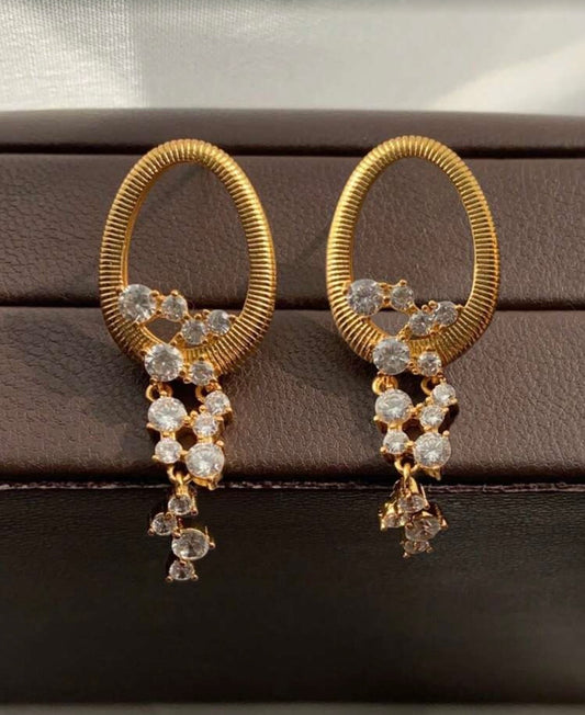 OVAL HOOP EARRINGS WITH STONE TASSELS