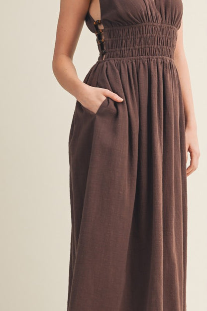 SLEEVELESS SIDE BUTTON SMOCKED WAIST MIDI DRESS WITH BEAD DETAIL