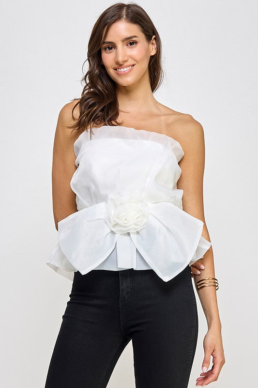 STRAPLESS ORGANZA PEPLUM TOP WITH FLOWER CORSAGE BOW