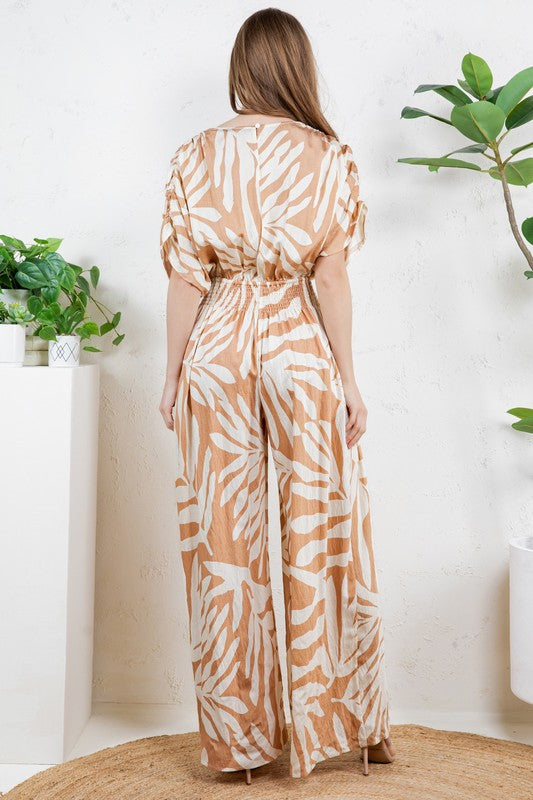V-NECK SMOCKED TIE WAIST JUMPSUIT