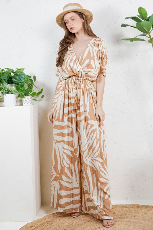 V-NECK SMOCKED TIE WAIST JUMPSUIT
