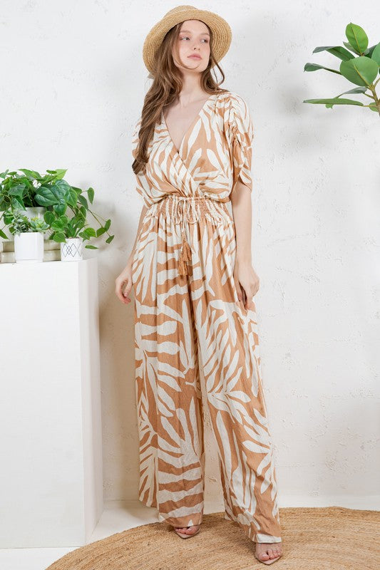 V-NECK SMOCKED TIE WAIST JUMPSUIT