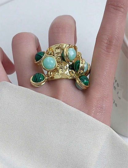 VINTAGE RING WITH PEACOCK STONES