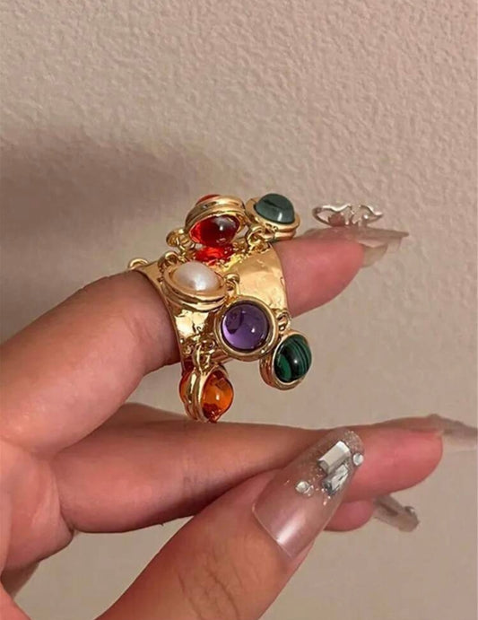 VINTAGE RING WITH PEACOCK STONES