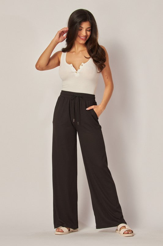 STRETCHY RIBBED DRAWSTRING POCKET WIDE LEG PANTS