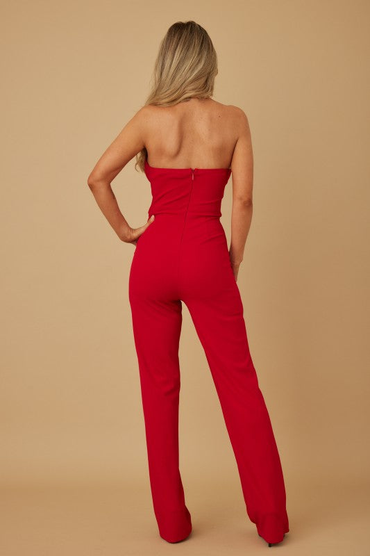 DRAPED STRAPLESS JUMPSUIT WITH GOLD