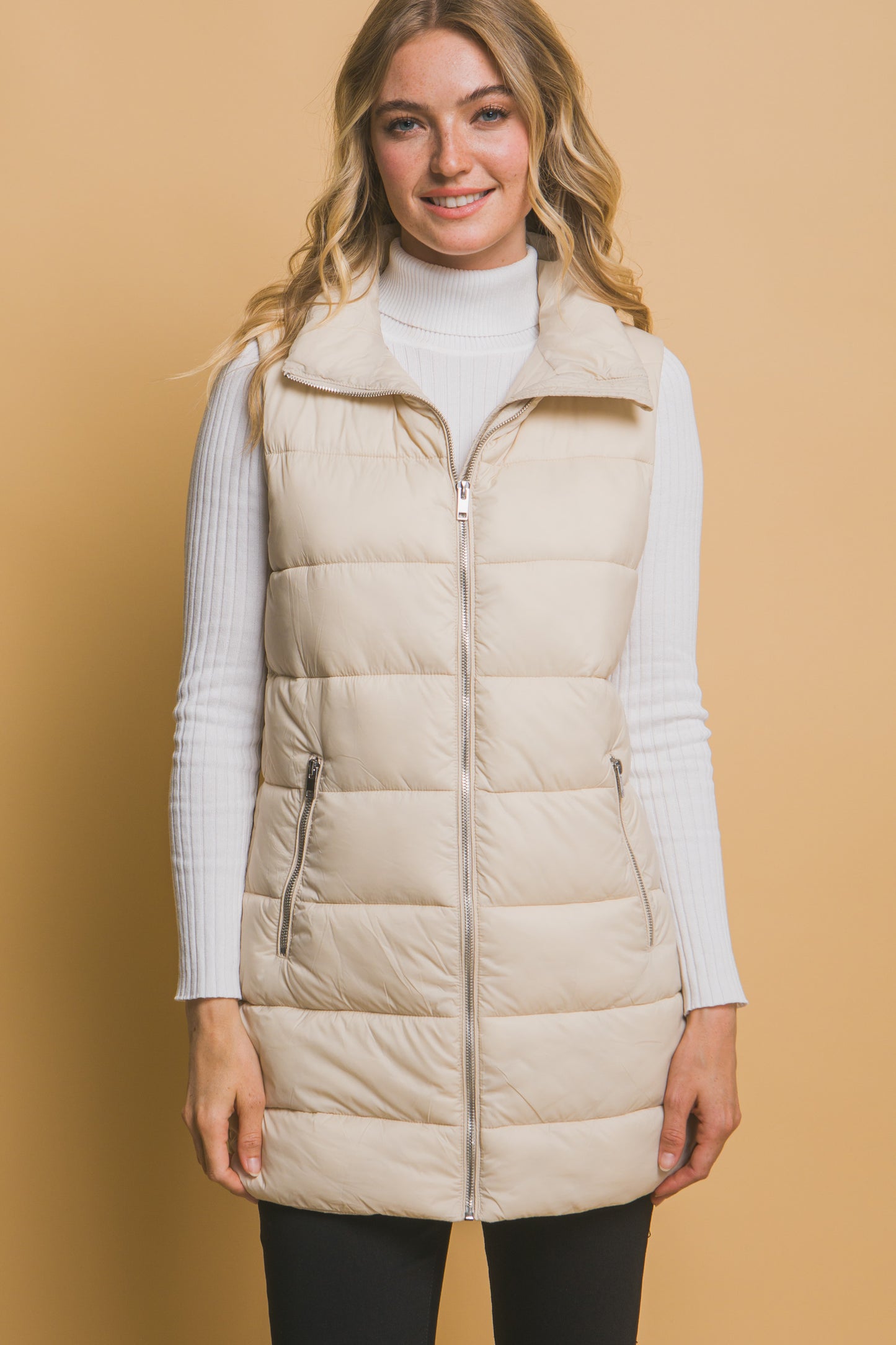 SLEEVLESS PUFFER VVEST WITH POCKETS