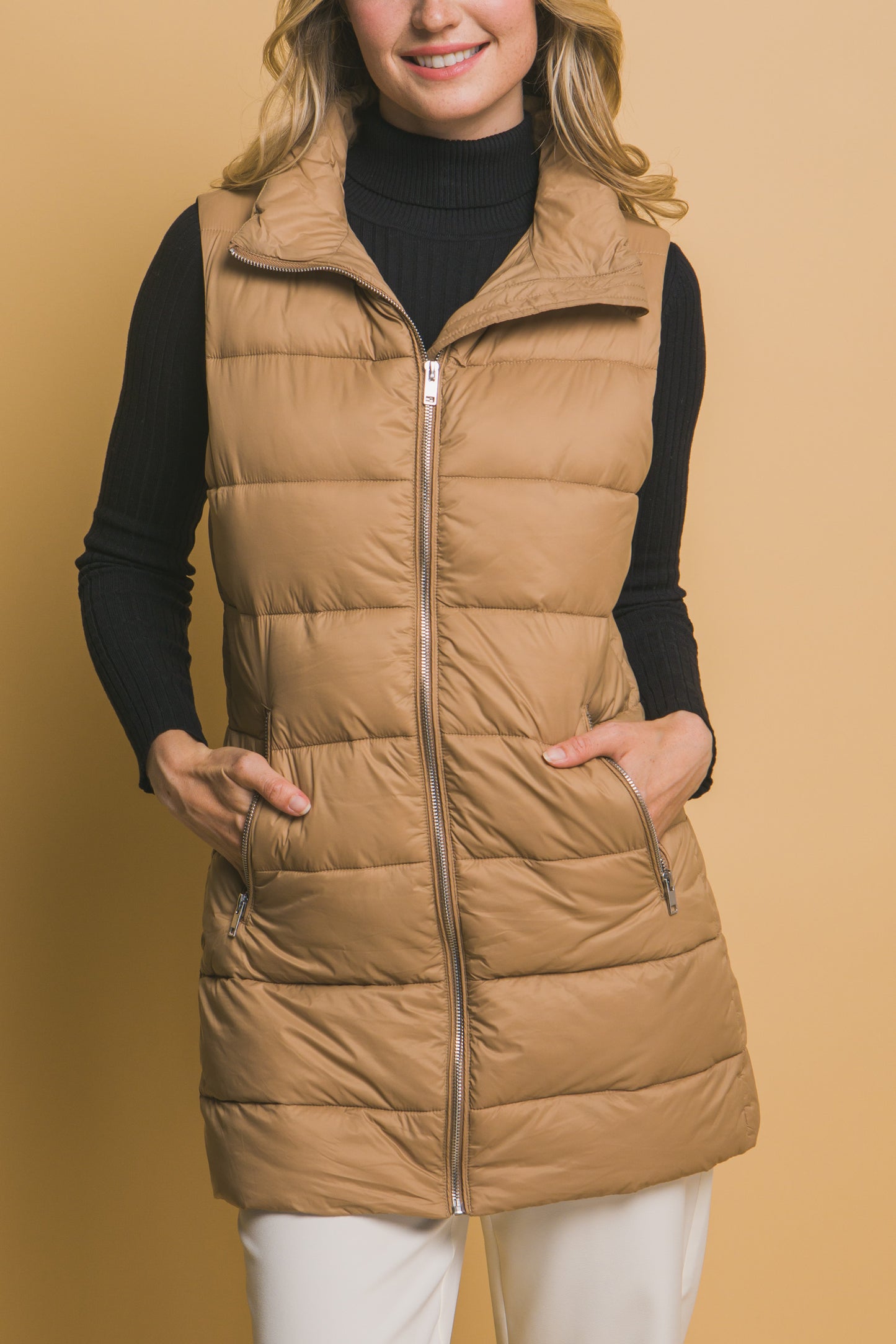 SLEEVLESS PUFFER VVEST WITH POCKETS