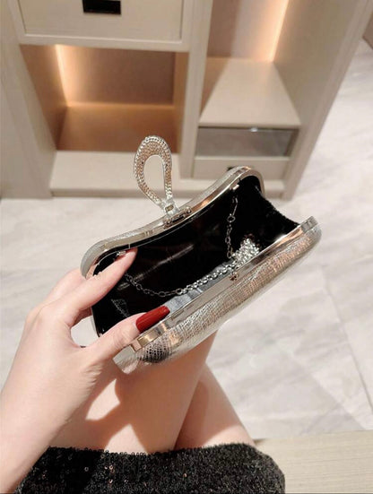 METALLIC GLOSSY LEATHER CLUTCH BAG