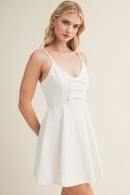 SEAMED BODICE TRIPLE BOW MINI DRESS