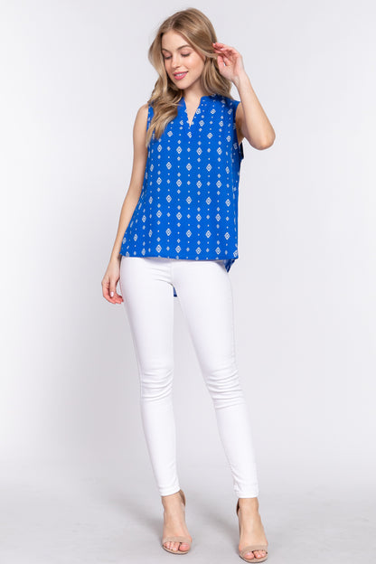 SLEEVELESS HI-LO PRINT BLOUSE